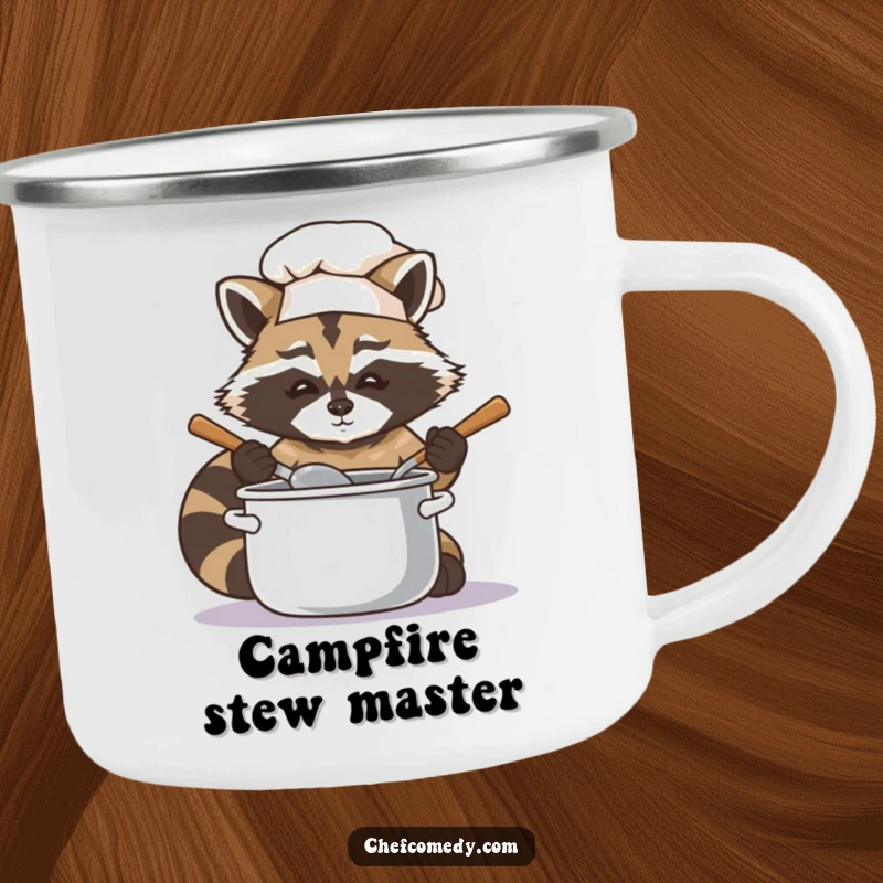 Sturdy camping mug featuring a funny raccoon chef intently stirring a pot, designed for outdoor culinary adventures.