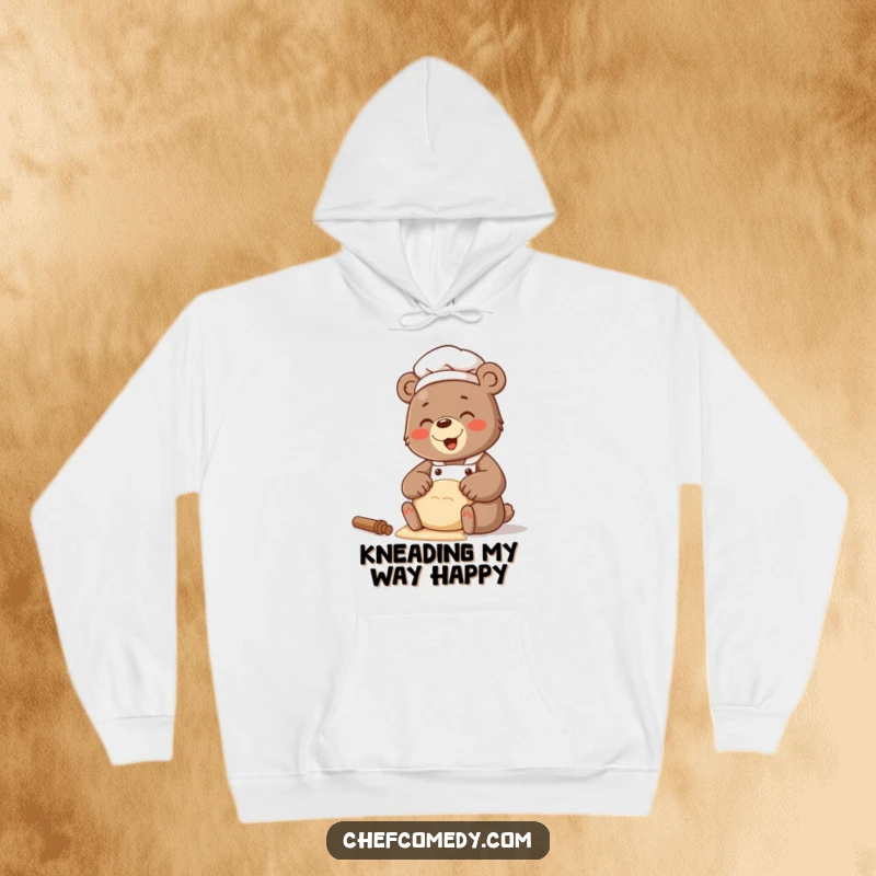 Funny hoodie featuring a bear chef with a contagious giggle while working on a batch of dough.
