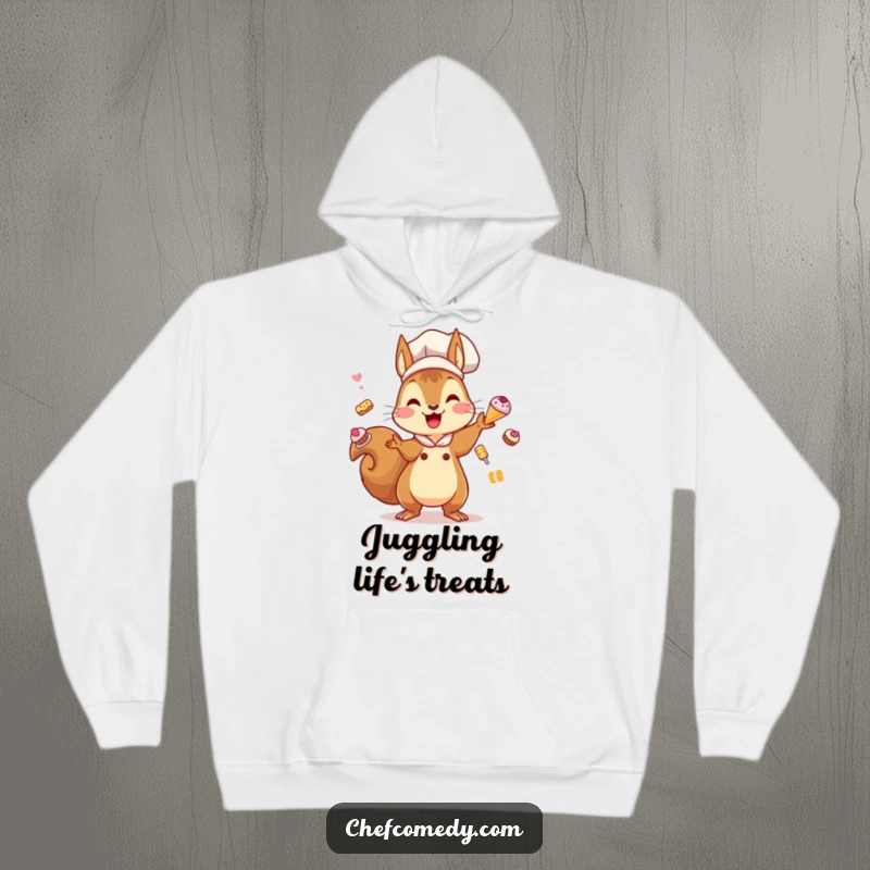 Funny Kawaii Squirrel Chef Hoodie: A cute squirrel chef is shown energetically juggling pastries, offering warmth and baking cheer.