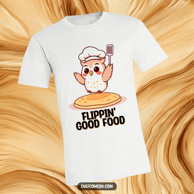 Funny Chef Owl T-Shirt: A small owl in a chef hat flips a pancake mid-air. Delightful and humorous cooking-themed apparel.