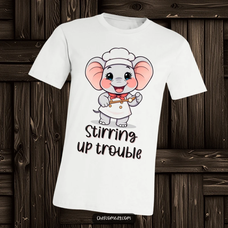 Funny Elephant Chef T-Shirt: A happy elephant in a chef hat, proudly holding a giant spoon, ready to cook.