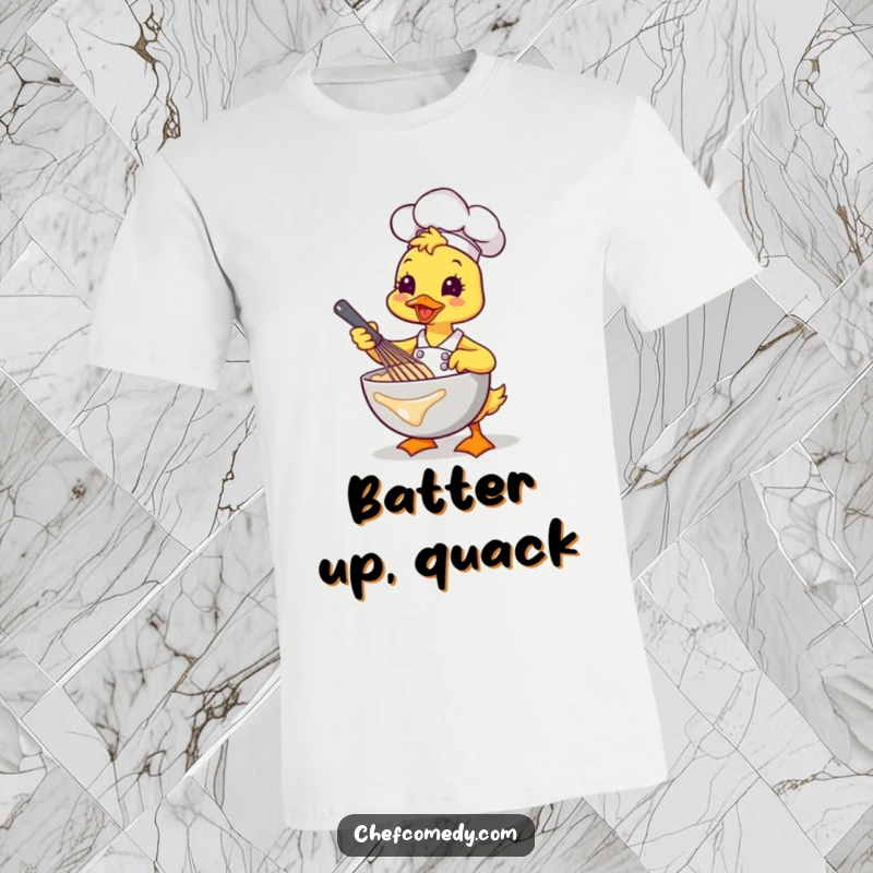 Funny Kawaii Duck Chef T-Shirt, a happy cartoon duck vigorously whisking batter with a flourish, a humorous and practical top.