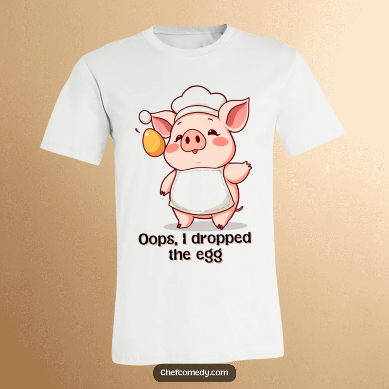 Funny Kawaii Pig Chef T-Shirt showing a pig in a small apron with wide eyes, surprised by a flying egg, for laughs.