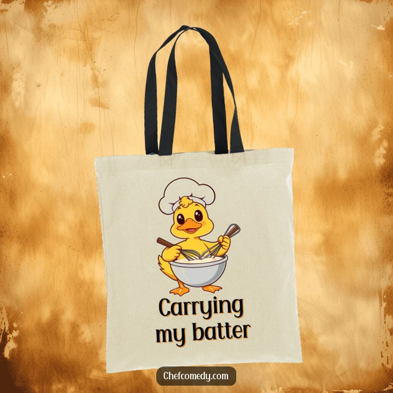 Funny tote bag featuring a focused duck chef vigorously whisking a bowl of batter, excellent for carrying baking ingredients.