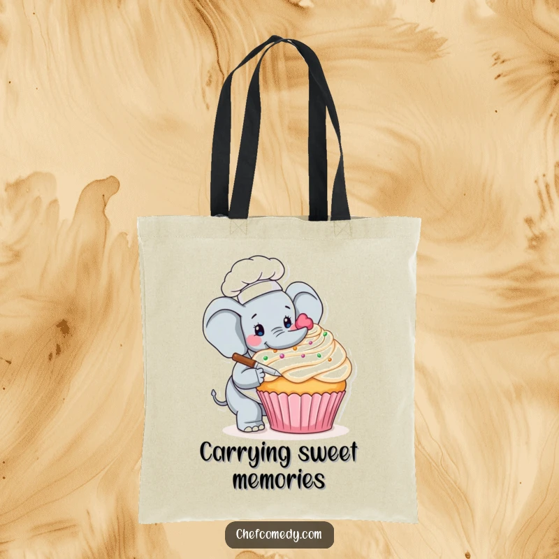 Funny tote bag featuring a meticulous elephant chef carefully decorating a massive cupcake, excellent for grocery shopping.