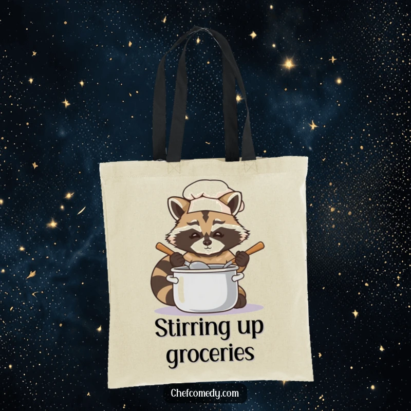 Humorous raccoon chef illustration on a tote bag, stirring a pot, combining practicality with a funny design.